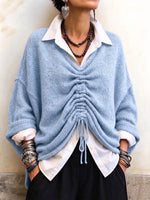 Cozy, Relaxed-fit Knit Top With A V-neck And Gathered Front Detail.