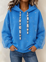 Sudadera con capucha elegante adornada con diamantes de imitación y mangas transparentes con cordón