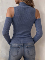 Top chic in maglia lavata a costine con zip intera e spalle scoperte