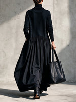 Casual Long Dress Featuring A High-neck Knit Bodice And Woven Skirt Panel.