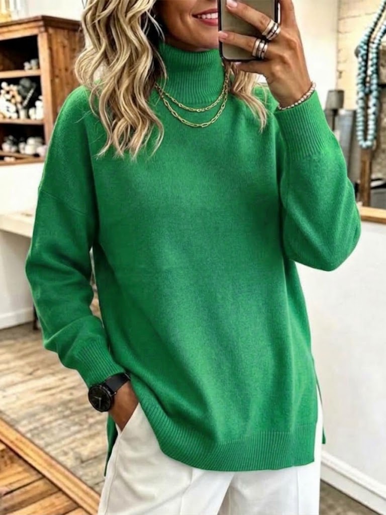 Jersey de punto holgado con cuello alto y abertura lateral