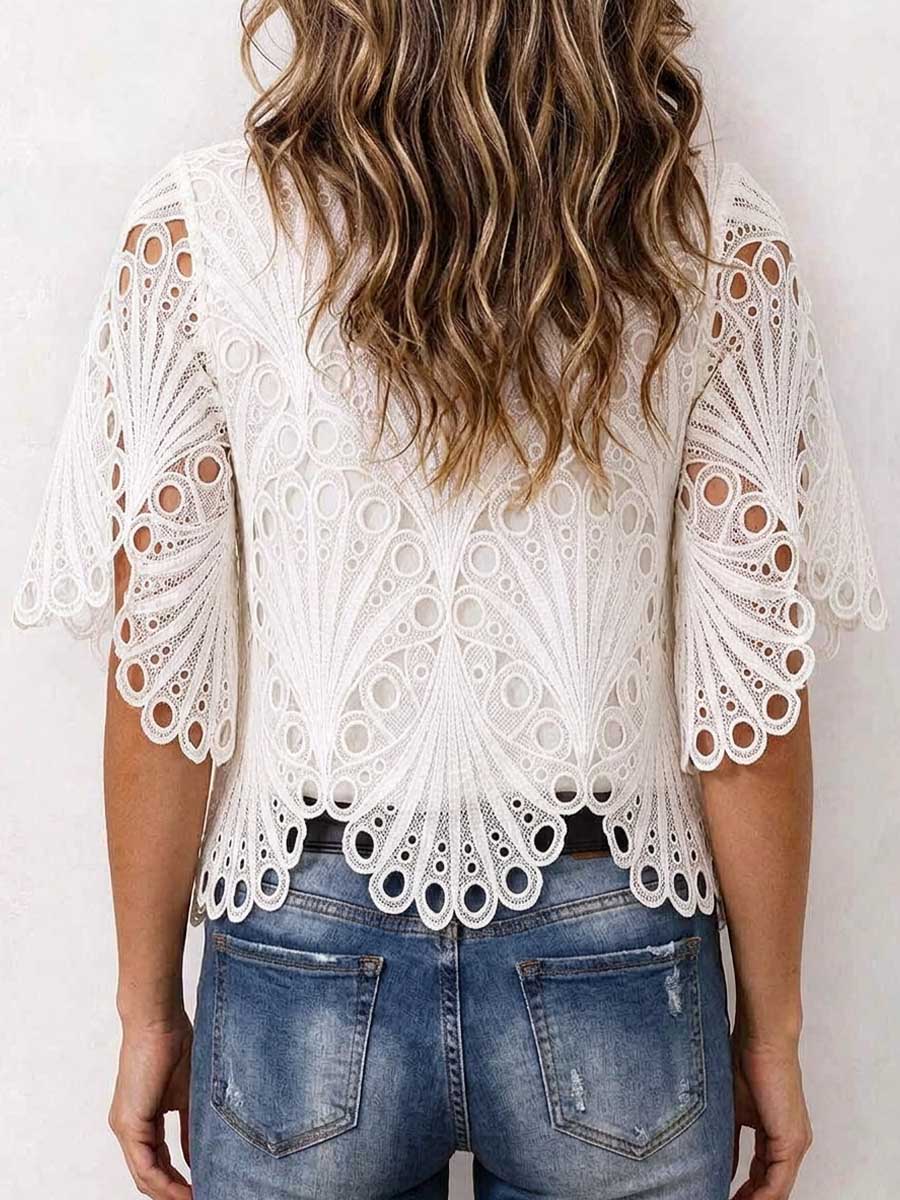 Top a maniche corte in pizzo floreale bianco scavato da donna