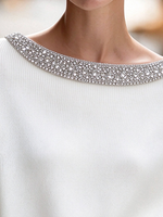 Elegante maglione lavorato a maglia con finiture in strass
