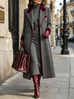 Elegante cappotto lungo in misto lana spinato