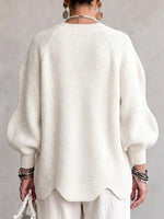 Loose-fit Knit Top With An Asymmetrical Placket, Large Metal Button, And Wavy Hem