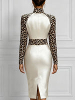 Chic Slim-fit Midi Dress Featuring Solid-color Satin And Leopard-print Paneling.