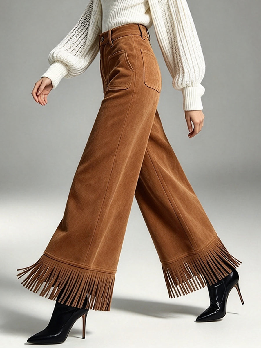 Pantaloni larghi in pelle scamosciata con frange chic