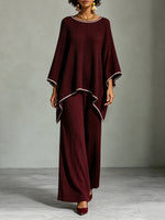 Loose And Cozy Two-piece Set Featuring A Ribbed Knit Top And Pants With Contrasting Piping.