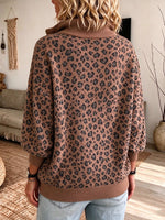 Lässiges Strickoberteil mit Leopardenmuster und halbem Reißverschluss