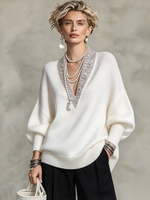 Eleganter luxuriöser Strickpullover mit V-Ausschnitt und Paillettenbesatz
