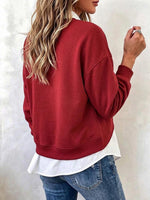 Women's 2-in-1 Layered Tulip Hem Pullover Top.
