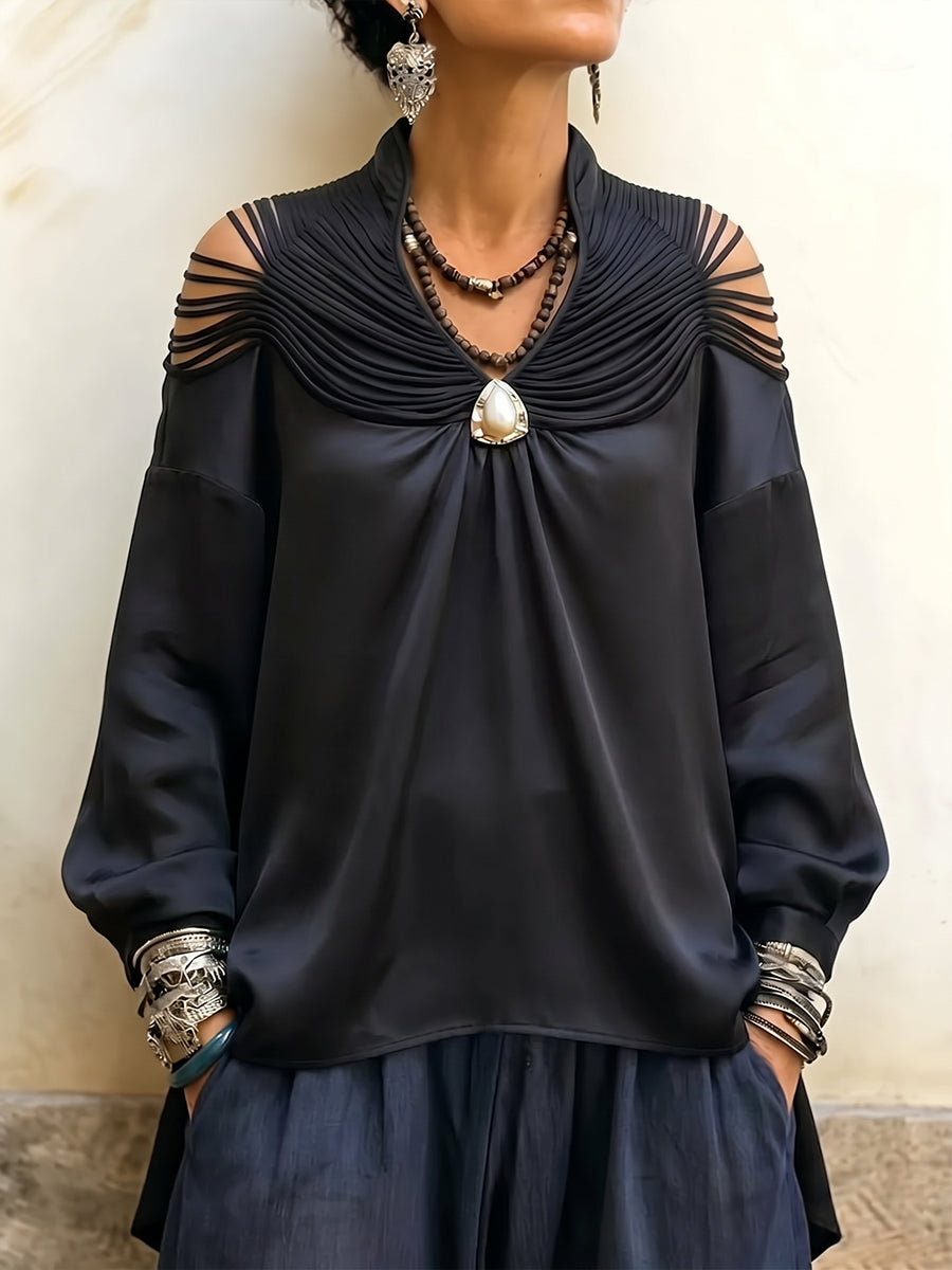 Blusa elegante de satén con detalle de tiras