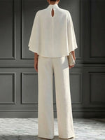 Elegant Solid-color Set Featuring A Mock-neck Cape-style Top And Split-leg Wide-leg Trousers