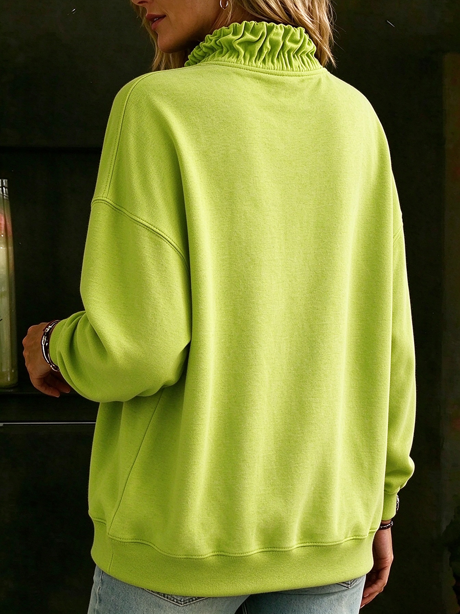 Felpa verde casual chic oversize con zip a un quarto e volant