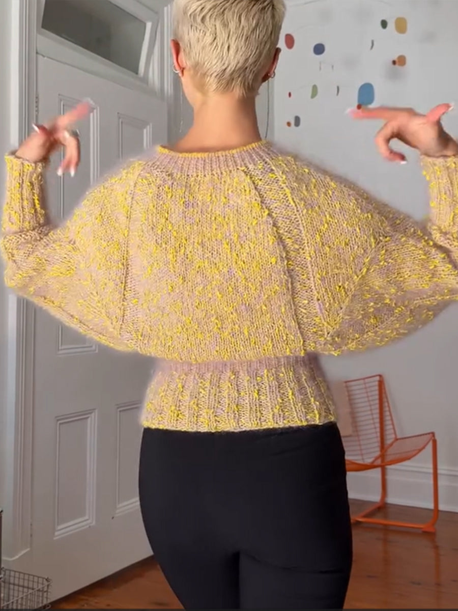Elegante cardigan con cerniera in maglia di misto lana a pois reversibili