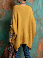 Pullover poncho oversize in maglia senape vivace