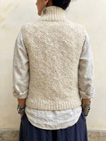 Gilet in maglia testurizzata con colletto rialzato e chiusure a levetta