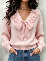 Elegante top in maglia con papillon in chiffon arricciato