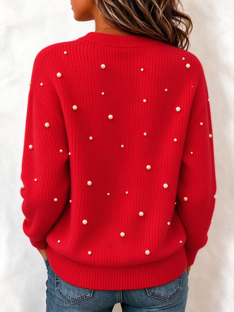 Pullover in maglia con mezza zip impreziosito da perle