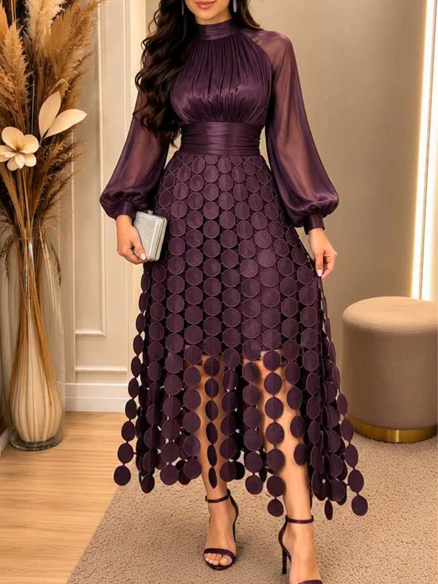 Elegantes Patchworkkleid mit Quasten