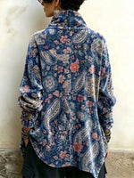 Top a collo alto in velluto con stampa cachemire floreale vintage e design asimmetrico con bottoni sul davanti