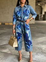 Artistic Denim Jumpsuit With Bold Blue Floral Print